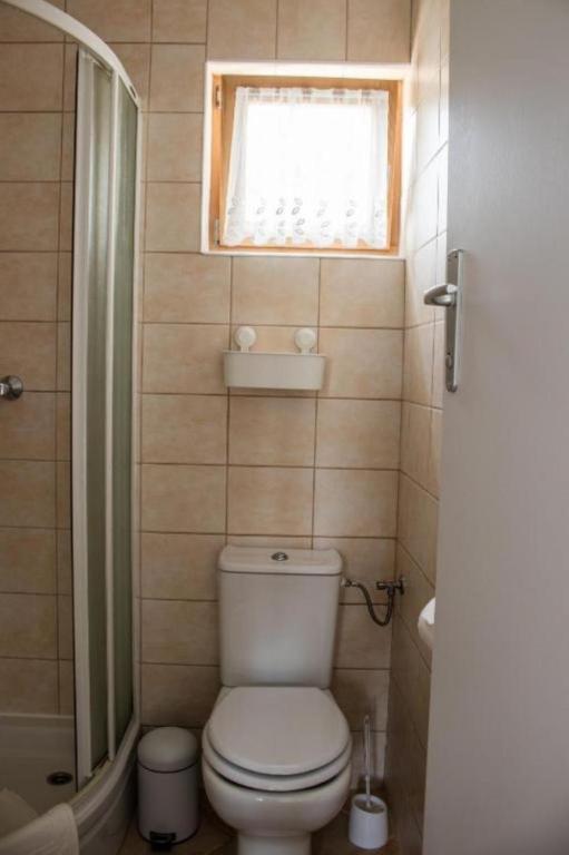 Kúpeľňa v ubytovaní Apartments Kike