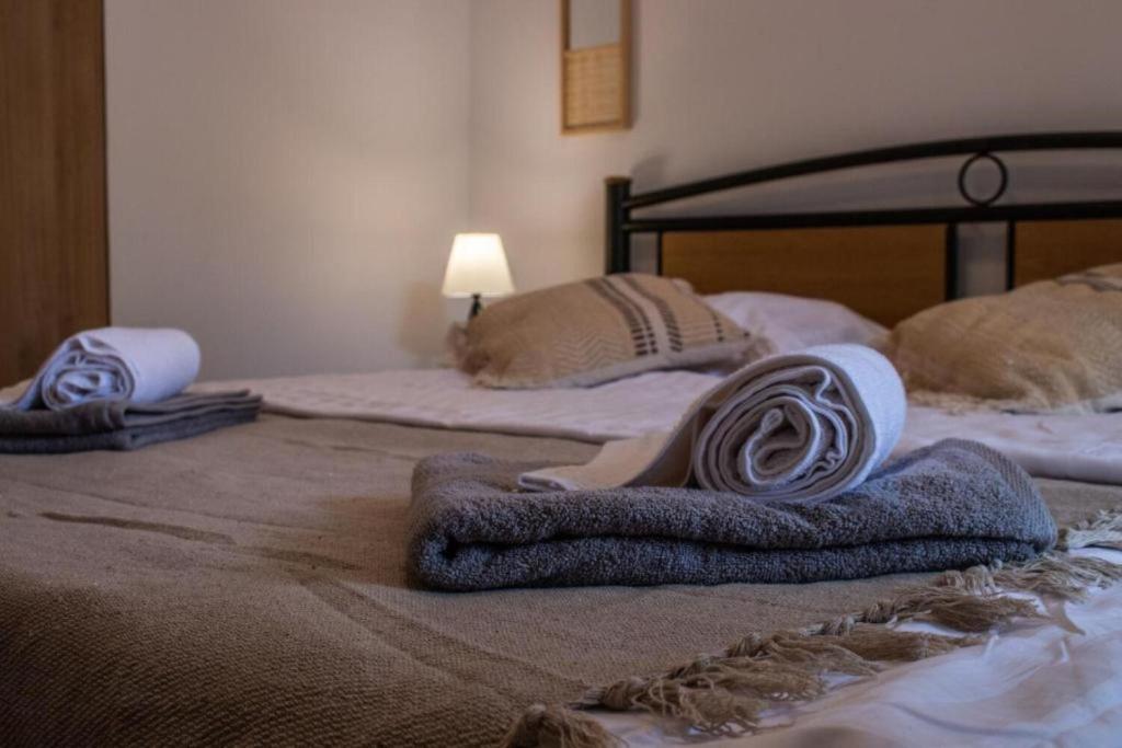 Posteľ alebo postele v izbe v ubytovaní Apartments Kike