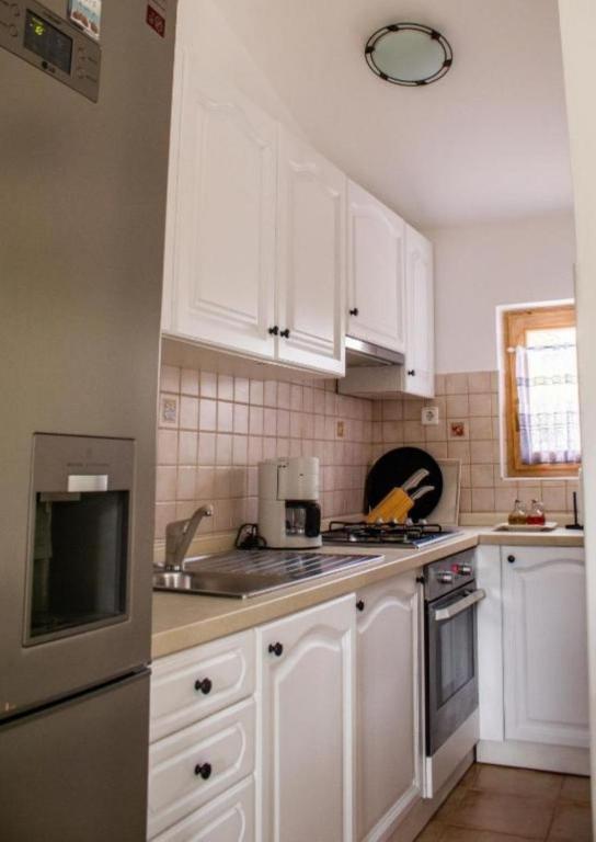 Kuchyňa alebo kuchynka v ubytovaní Apartments Kike