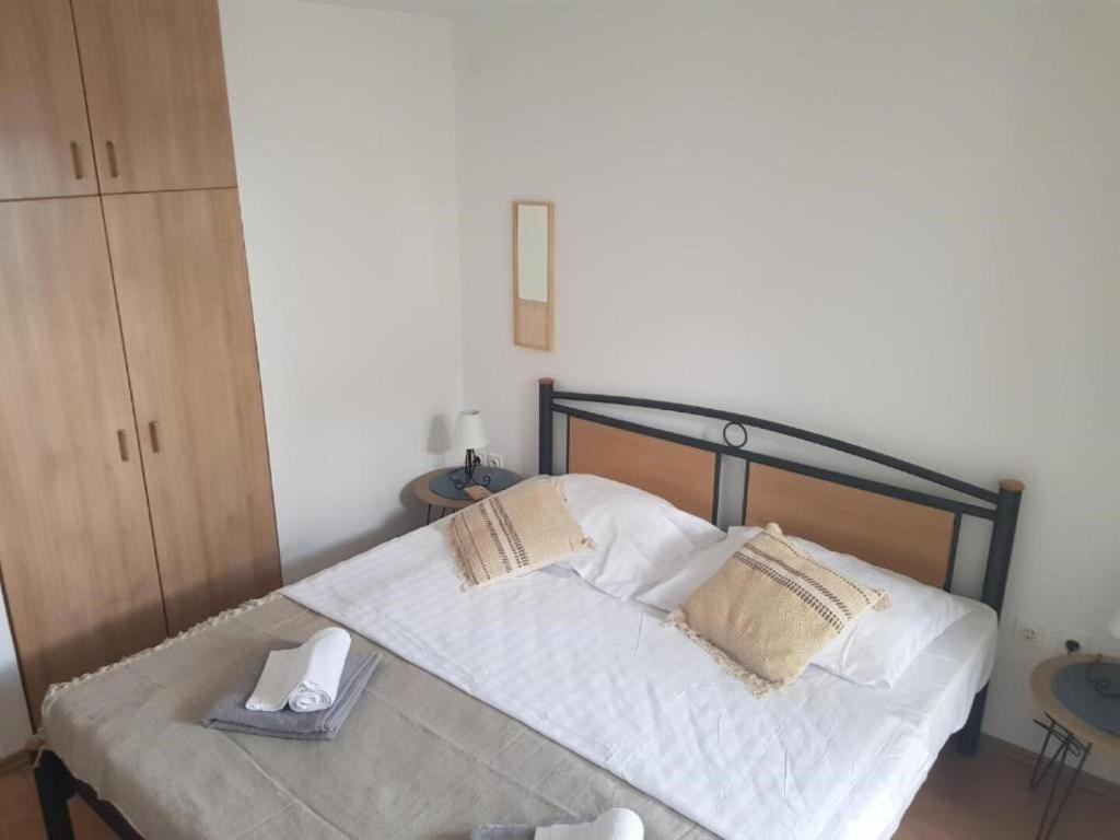 Posteľ alebo postele v izbe v ubytovaní Apartments Kike