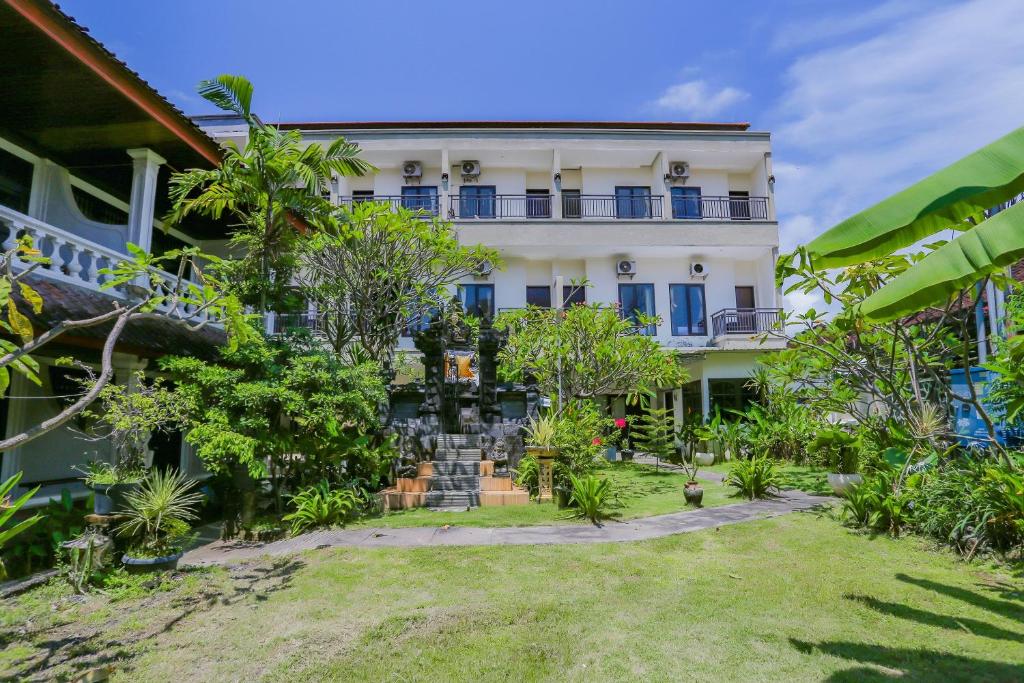 Zahrada ubytování OYO 4012 Ari Beach Inn