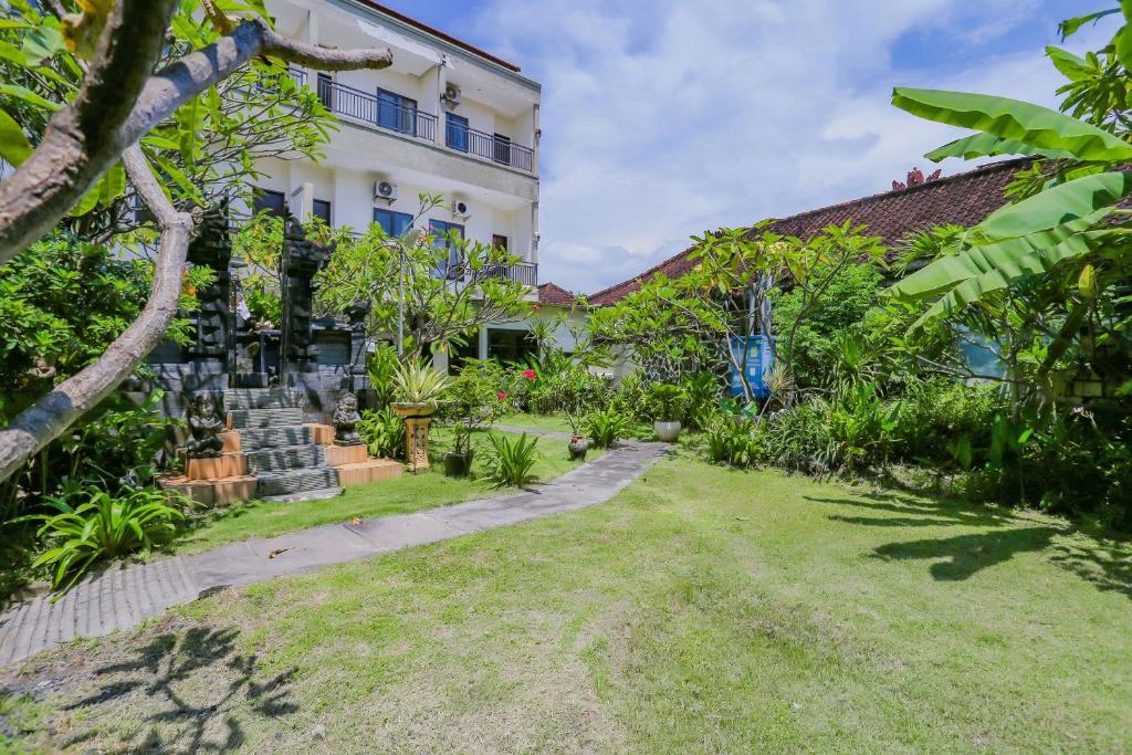 Zahrada ubytování OYO 4012 Ari Beach Inn
