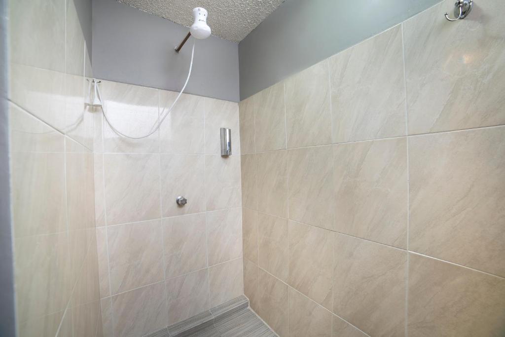Koupelna v ubytování Capital O Hotel Diez