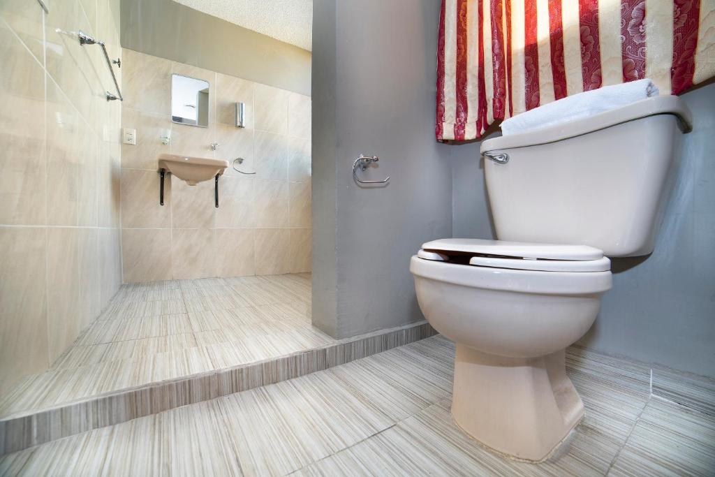 Koupelna v ubytování Capital O Hotel Diez