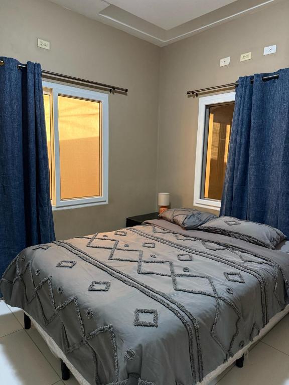 Postel nebo postele na pokoji v ubytování 5 minutos de UNITEC Apartamento completo de un cuarto