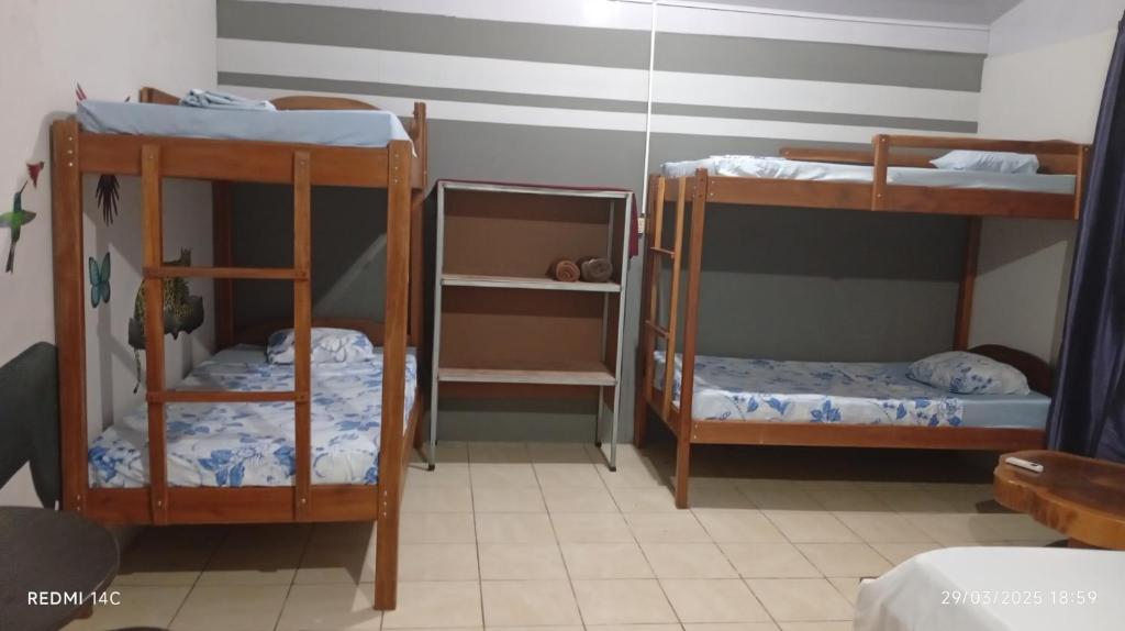 Postel nebo postele na pokoji v ubytování Brisas del Mar