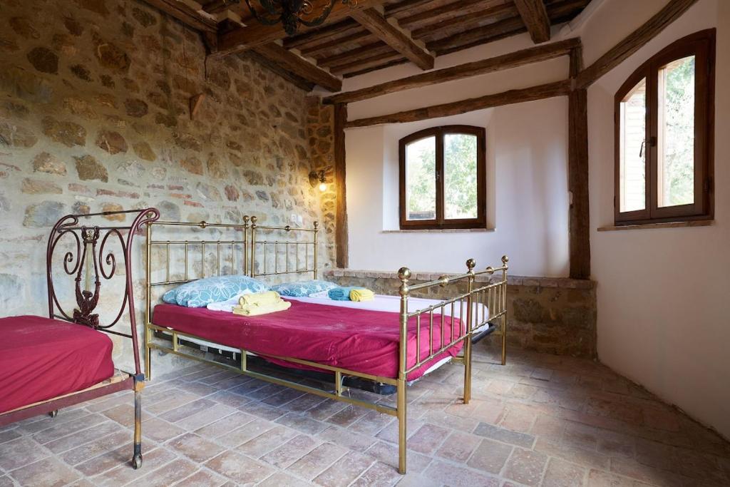 Postel nebo postele na pokoji v ubytování Tirisondola - La Capanna