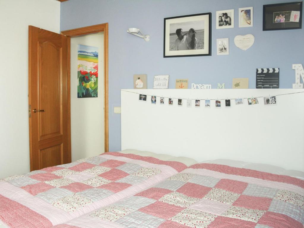 Postel nebo postele na pokoji v ubytování Belvilla by OYO Marinada