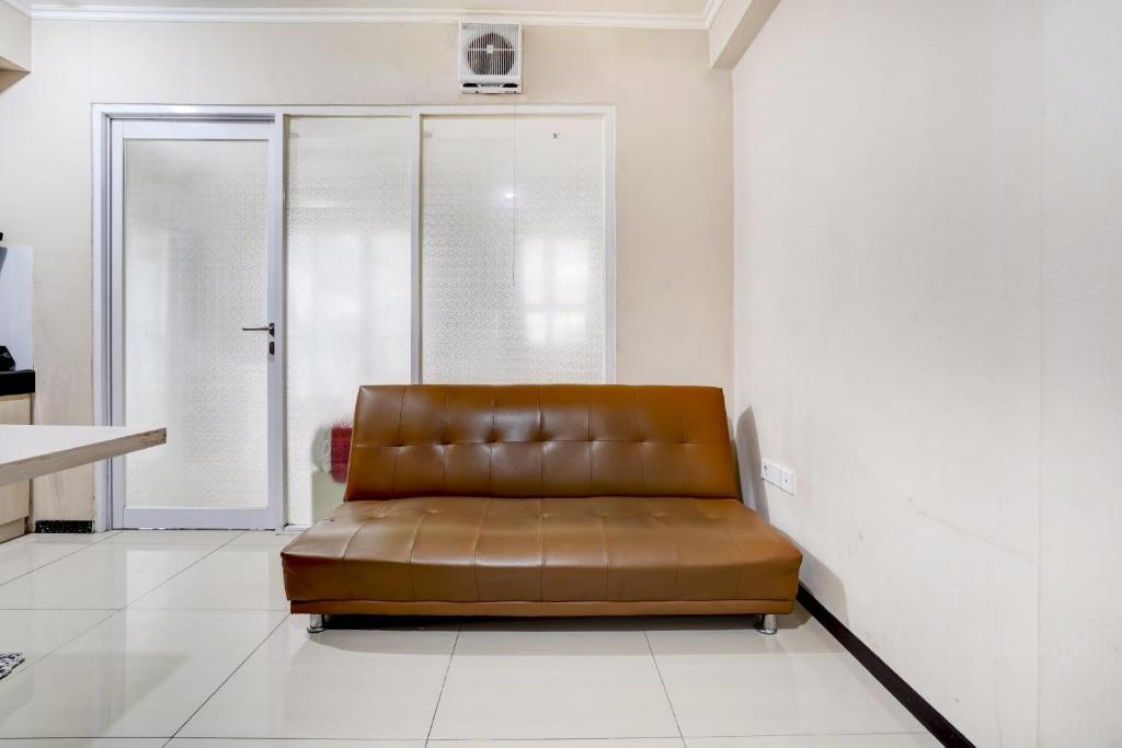 Posezení v ubytování Collection O 90205 Queen Rent Apartment Gateway Pasteur