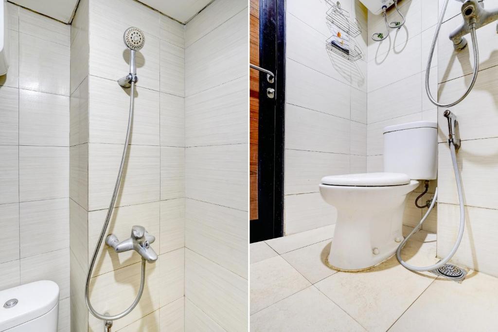 Koupelna v ubytování Collection O 90205 Queen Rent Apartment Gateway Pasteur