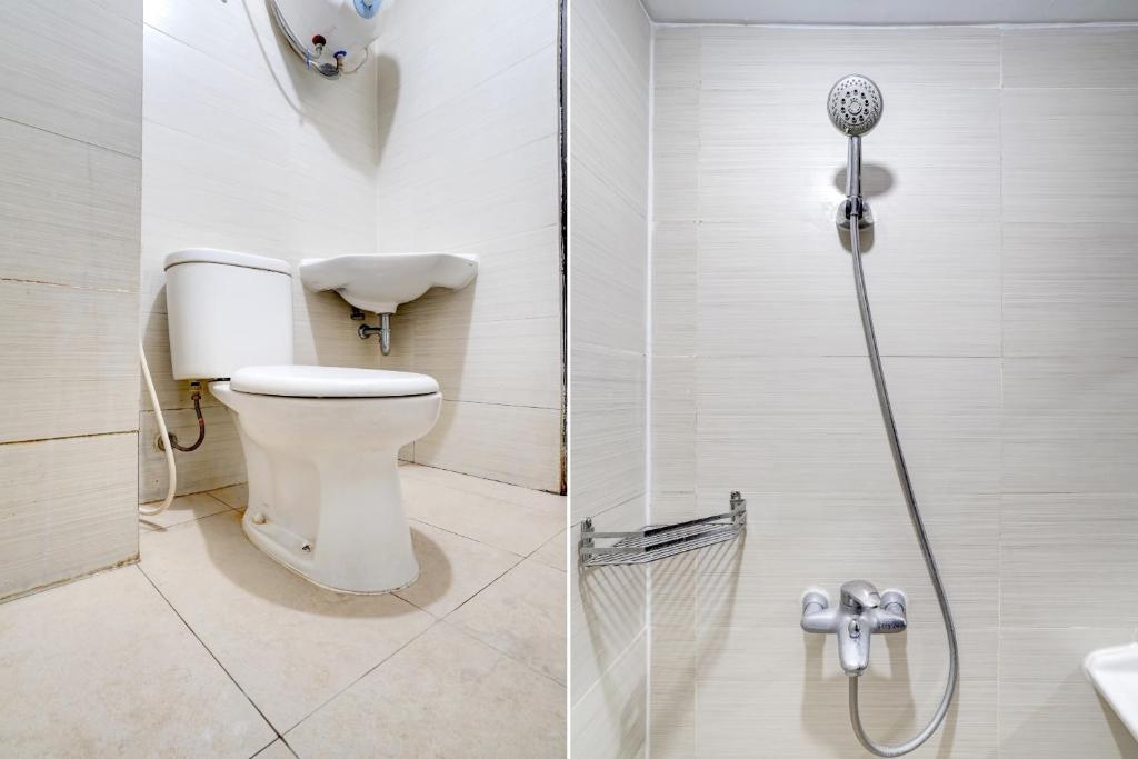 Koupelna v ubytování Collection O 90205 Queen Rent Apartment Gateway Pasteur