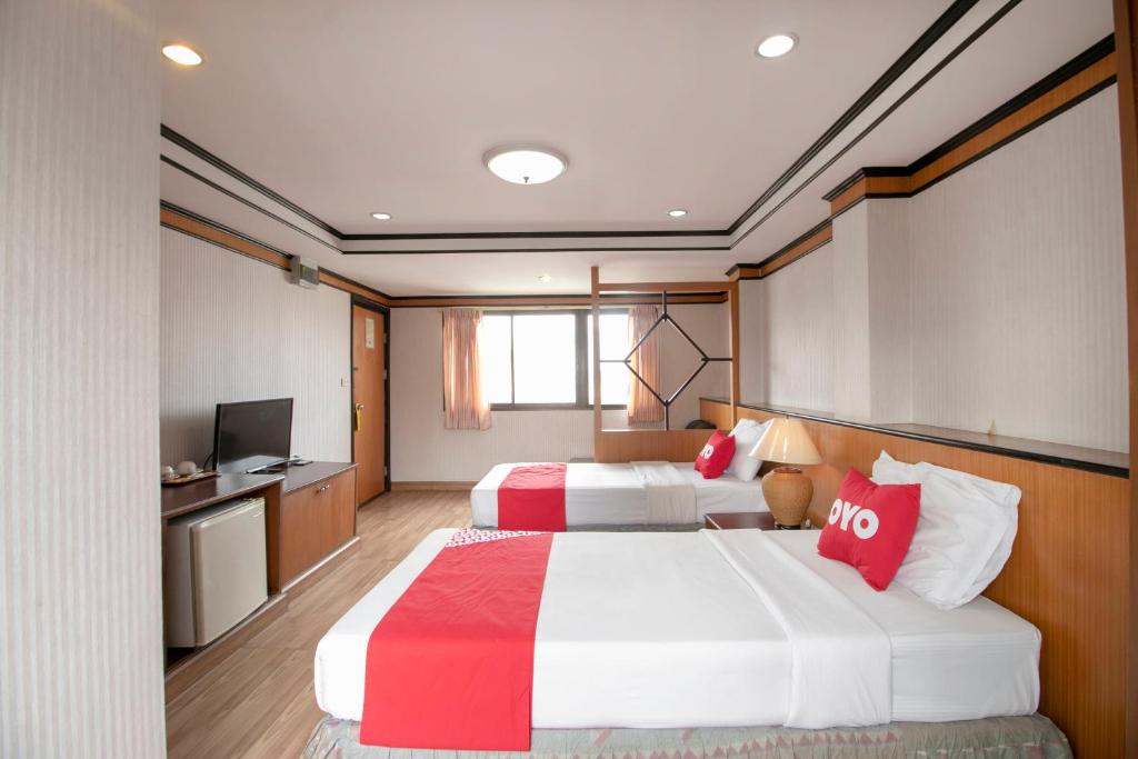 Postel nebo postele na pokoji v ubytování Hotel Win Long