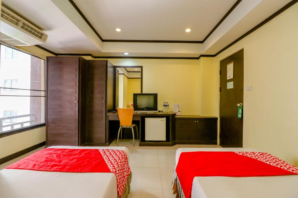 Postel nebo postele na pokoji v ubytování Hotel Win Long