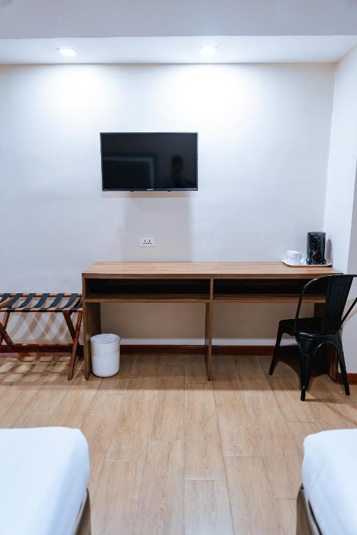 TV a/nebo společenská místnost v ubytování S Hotel & Residences