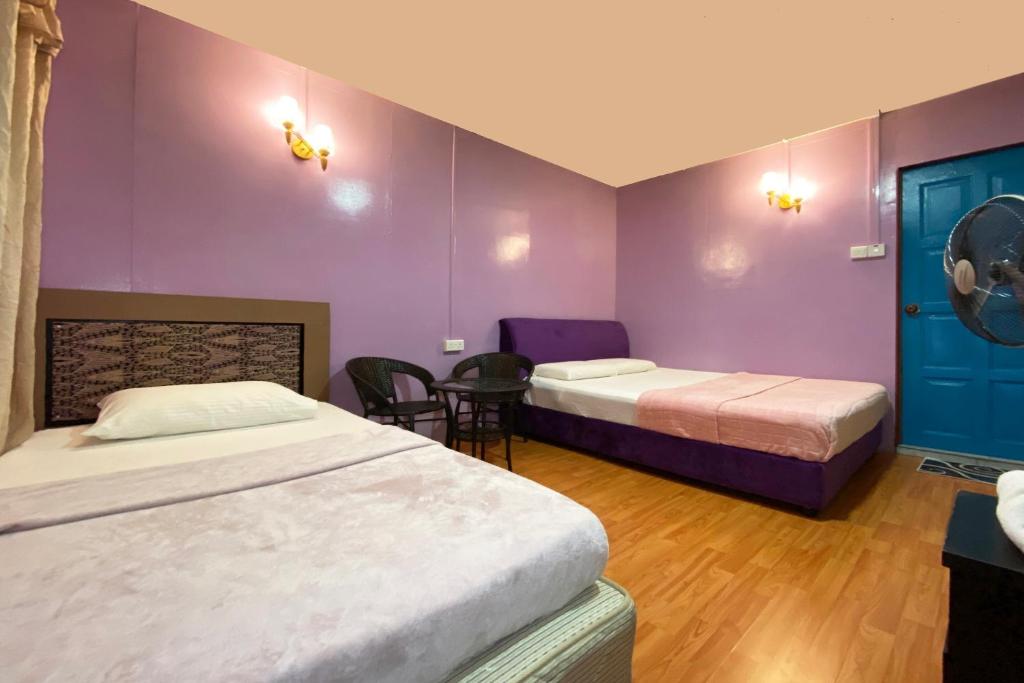 Hotel O Pogimpaan Homestay - Camera Tripla Con Bagno Privato
