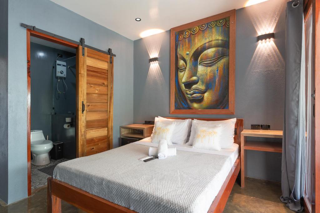 En eller flere senge i et værelse på Casa De Loren Family Room