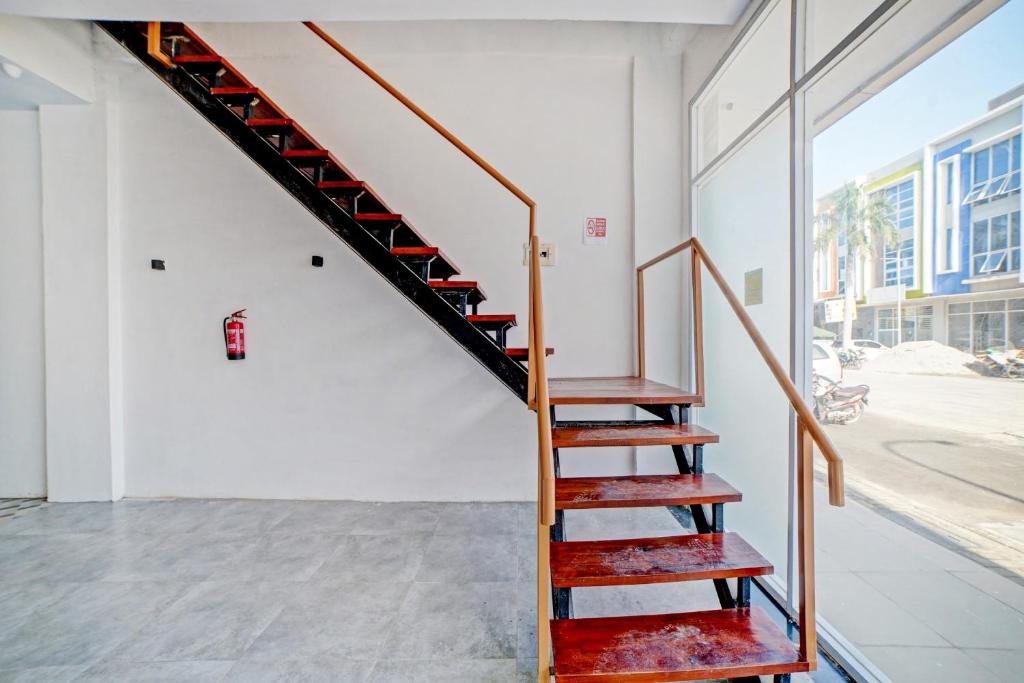 Fotografie z fotogalerie ubytování Super OYO 90559 Gamacity Residence v destinaci Pulauberayan Dadap