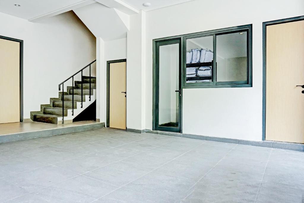 Fotografie z fotogalerie ubytování Super OYO Capital O 90635 Tango Juliet Residence v destinaci Jakarta