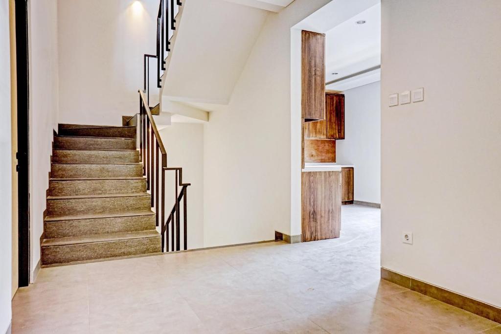 Fotografie z fotogalerie ubytování Super OYO Capital O 90635 Tango Juliet Residence v destinaci Jakarta