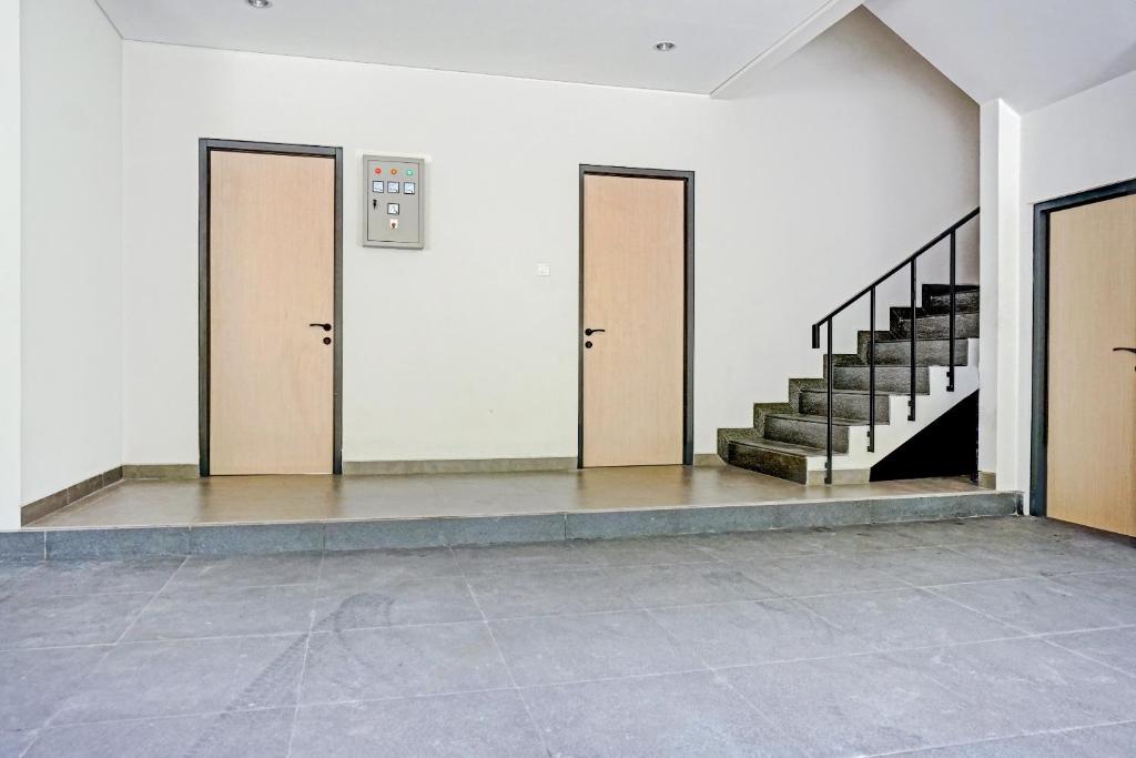 Fotografie z fotogalerie ubytování Super OYO Capital O 90635 Tango Juliet Residence v destinaci Jakarta