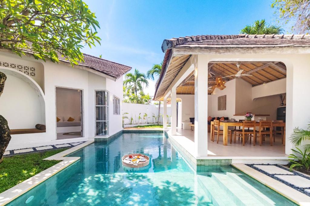 an image of a villa with a swimming pool at Villa Cocodrilos 1 in Seminyak