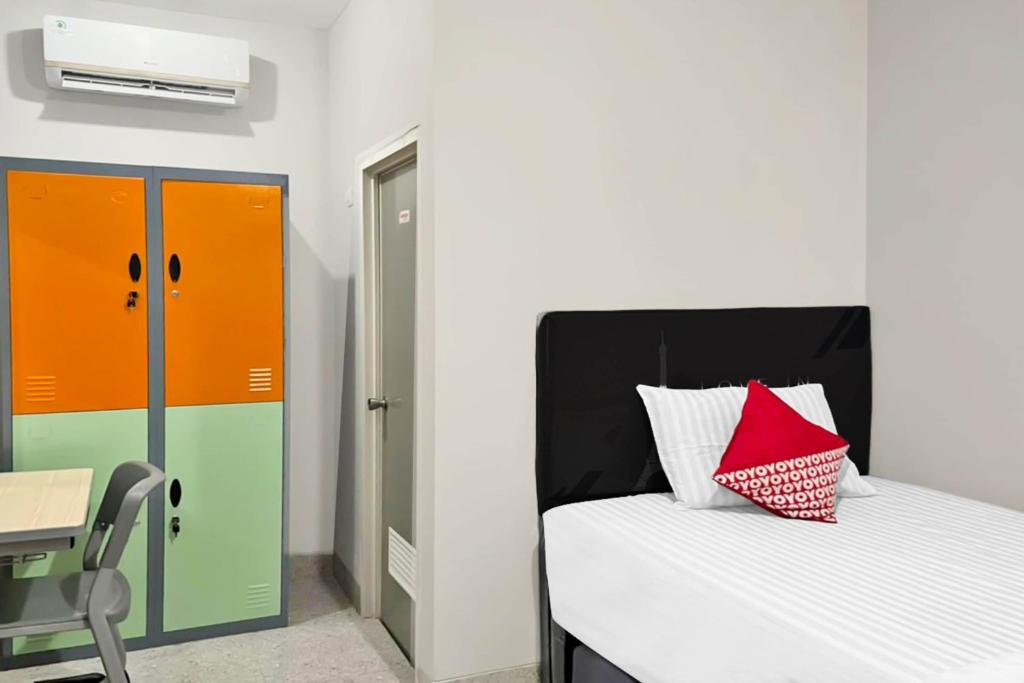 Postel nebo postele na pokoji v ubytování OYO 90708 Kbr Home