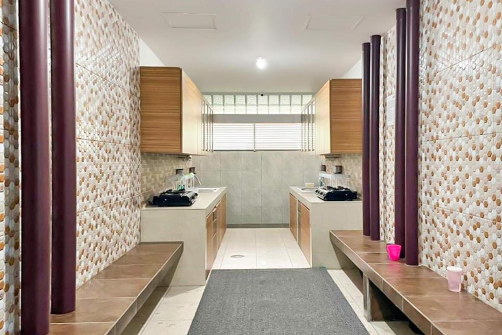 Kuchyň nebo kuchyňský kout v ubytování OYO 90708 Kbr Home