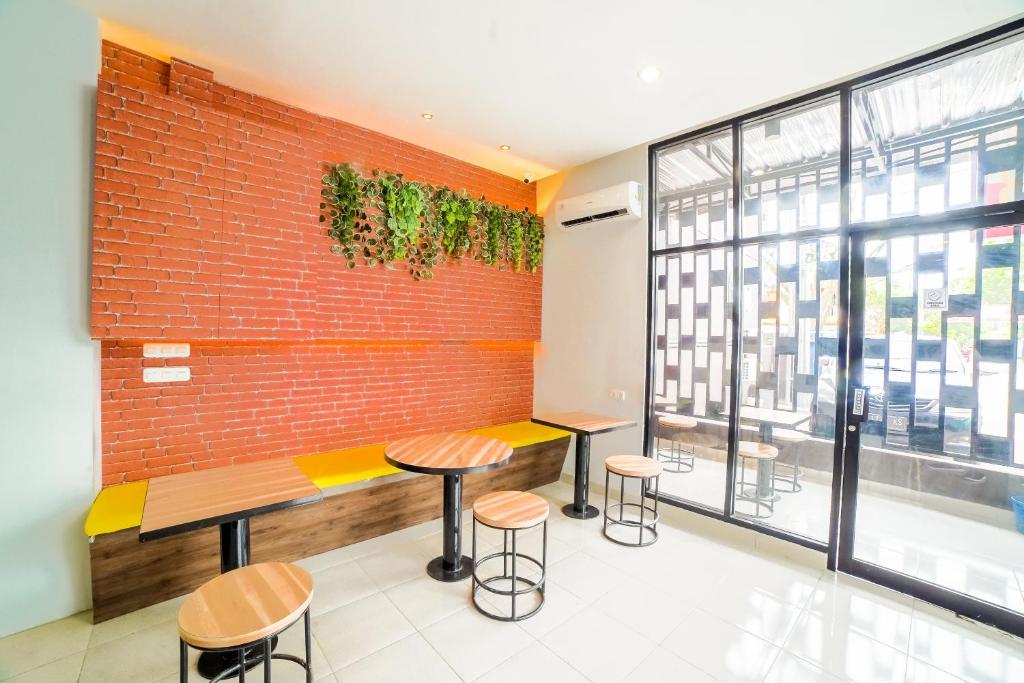 Fotografie z fotogalerie ubytování Capital O 90874 Millenium Inn 2 v destinaci Medan