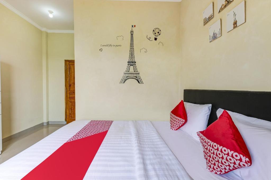 Postel nebo postele na pokoji v ubytování SUPER OYO 90905 Dangau Datuk Guesthouse