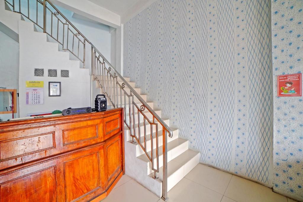 Fotografie z fotogalerie ubytování OYO 90922 Gurusinga Guesthouse v destinaci Medan
