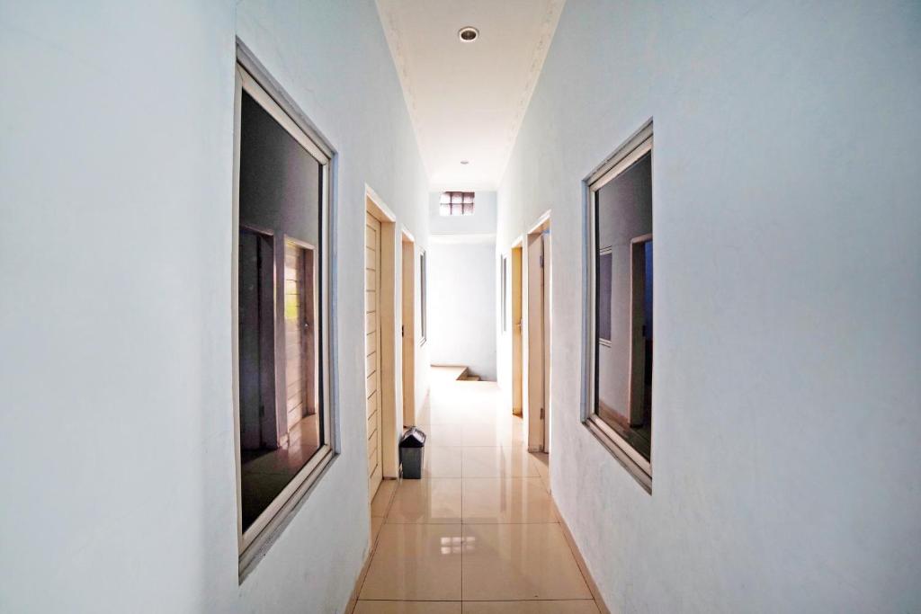 Fotografie z fotogalerie ubytování OYO 90922 Gurusinga Guesthouse v destinaci Medan