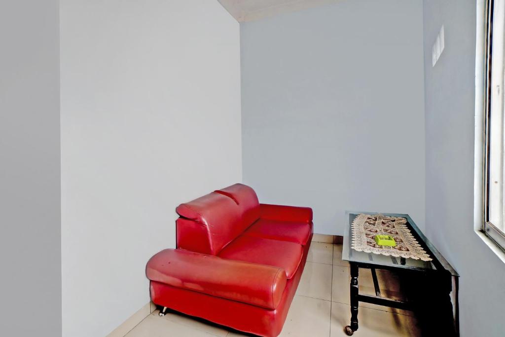 Posezení v ubytování OYO 90922 Gurusinga Guesthouse
