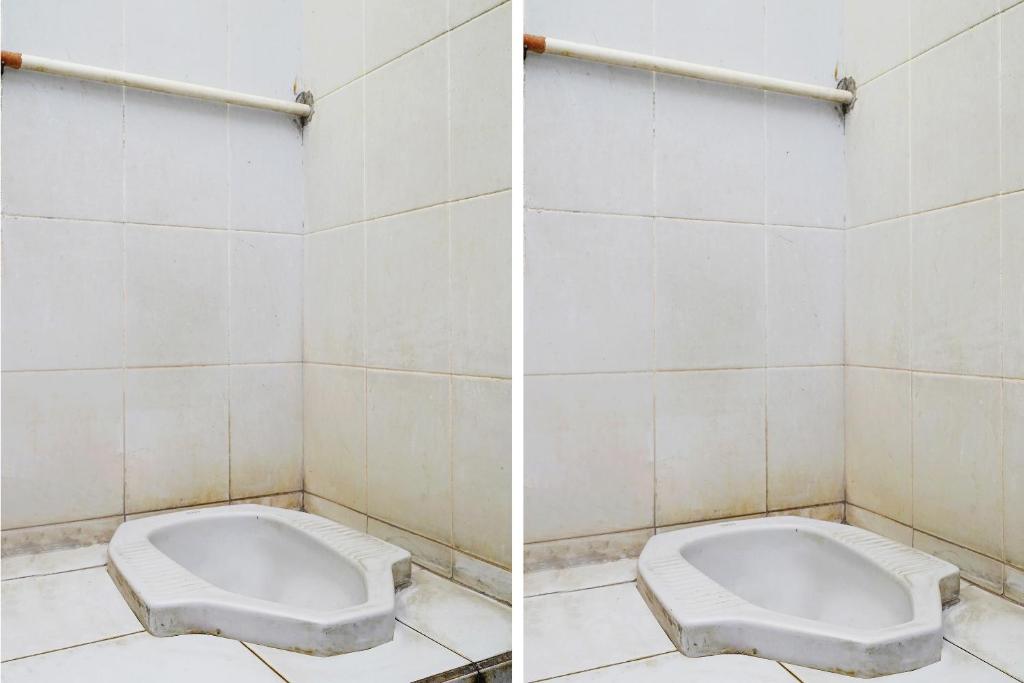 Un baño de SPOT ON 91064 Wisma Lec Syariah