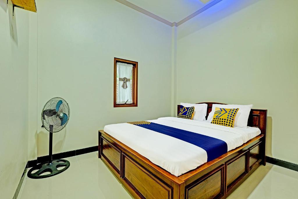 Fotografie z fotogalerie ubytování OYO Homes 91095 Desa Wisata Conto v destinaci Plaosan