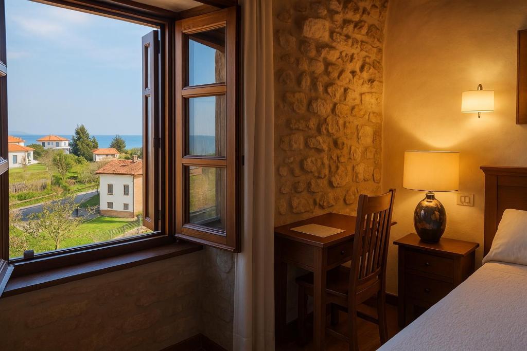 A bed or beds in a room at El Juacu