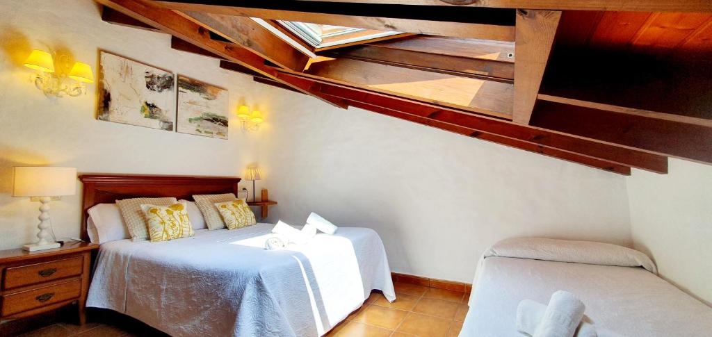 A bed or beds in a room at El Juacu