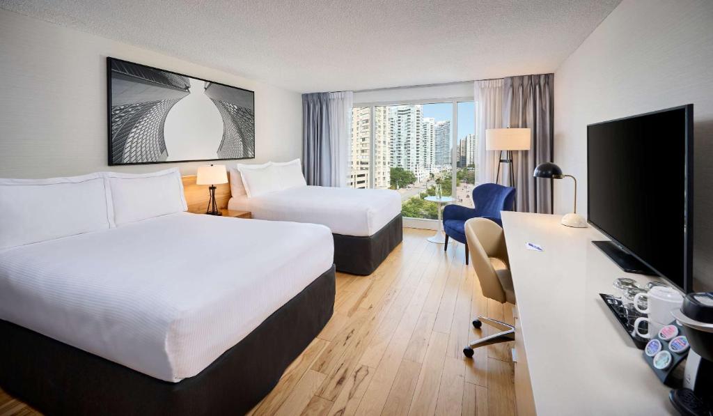 Postel nebo postele na pokoji v ubytování Radisson Blu Toronto Downtown
