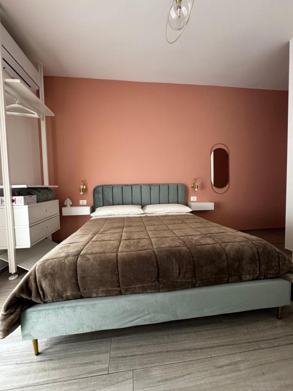 A bed or beds in a room at Profumo d'aMARE