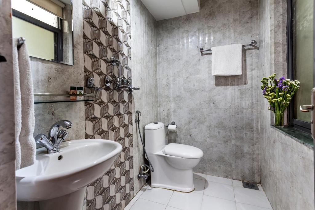 Koupelna v ubytování OYO 123 Hotel Prince Plaza