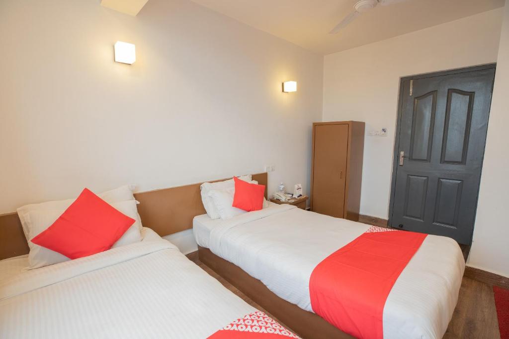 Postel nebo postele na pokoji v ubytování OYO 123 Hotel Prince Plaza