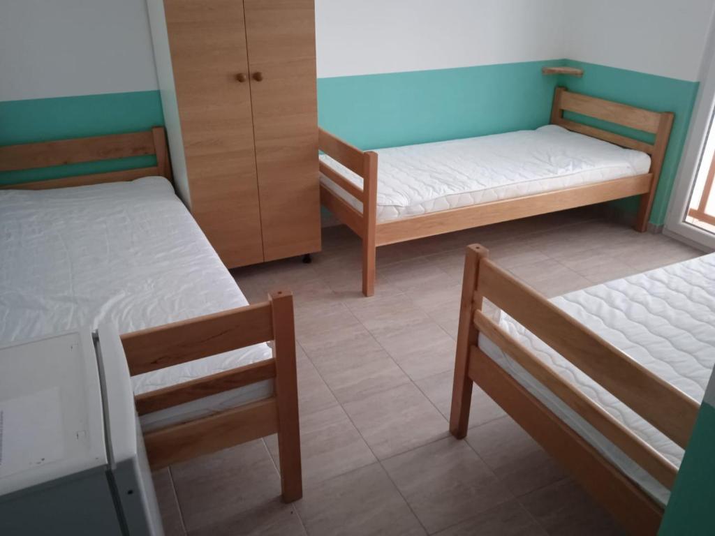 Krevet ili kreveti u jedinici u objektu Hostel & Rooms Vagabundo