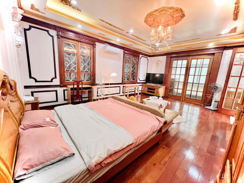 Ένα ή περισσότερα κρεβάτια σε δωμάτιο στο Cozy Apartment Văn Cao Garden Villa - Homestay
