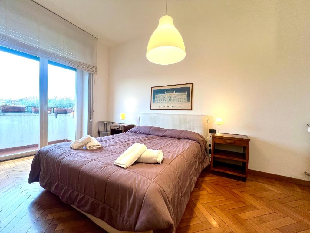 A bed or beds in a room at Casa Pinturicchio