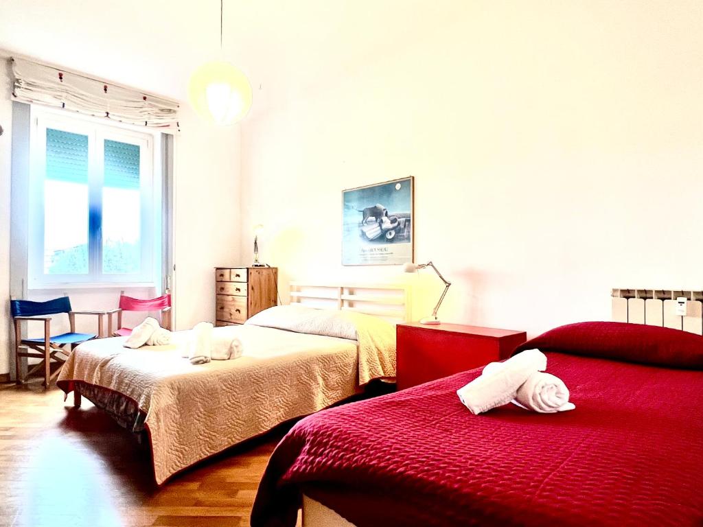 A bed or beds in a room at Casa Pinturicchio