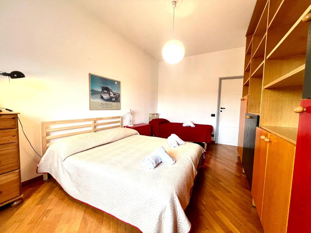 A bed or beds in a room at Casa Pinturicchio