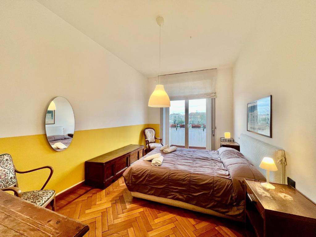 A bed or beds in a room at Casa Pinturicchio