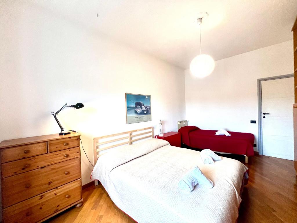 A bed or beds in a room at Casa Pinturicchio