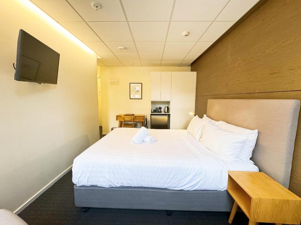 Postel nebo postele na pokoji v ubytování Park Hotel, Lambton Quay