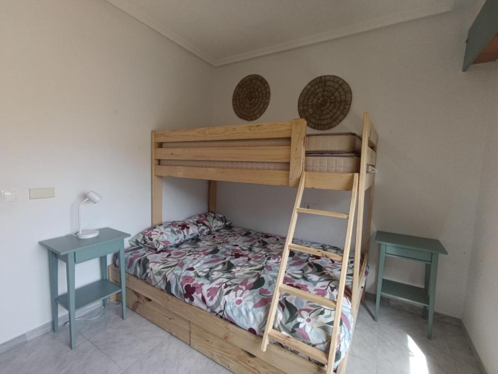 Postel nebo postele na pokoji v ubytování Apartamento Petrel II