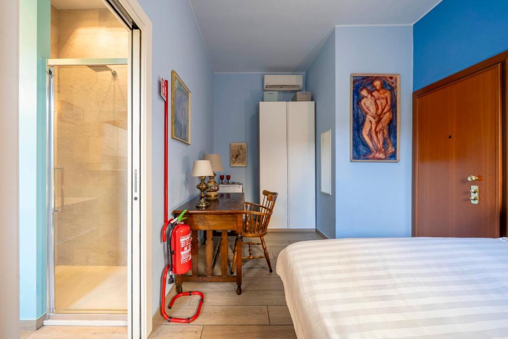 Postel nebo postele na pokoji v ubytování Charming Room Battaglia Appartamenti